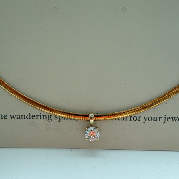 Elegant Gold Plated Necklace with 2 karat lab grown diamond.